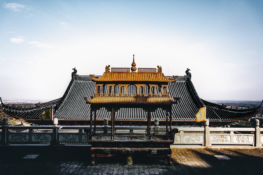 Traditional oriental wooden element of pagoda roof of Chinese temple